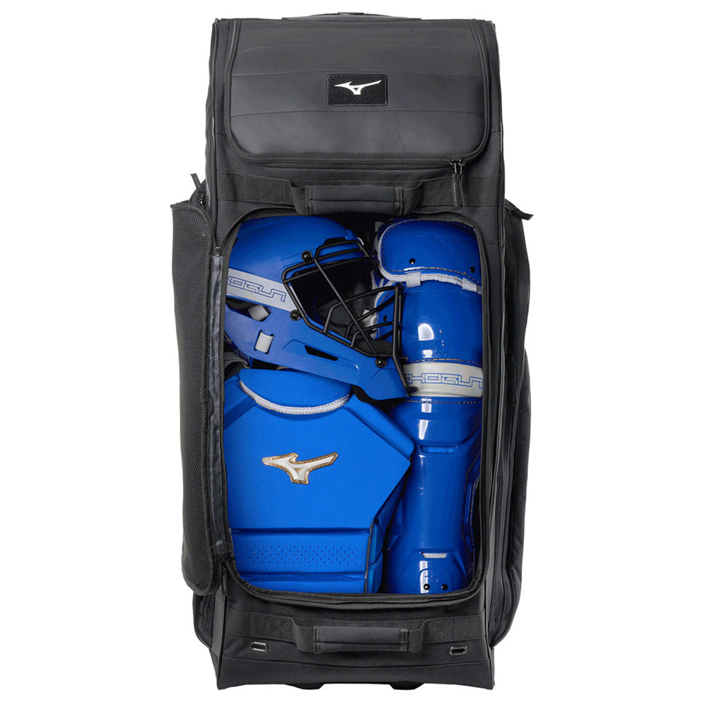 Maleta Mizuno Shogun con ruedas negro, compartimento principal abierto con equipo de catcher